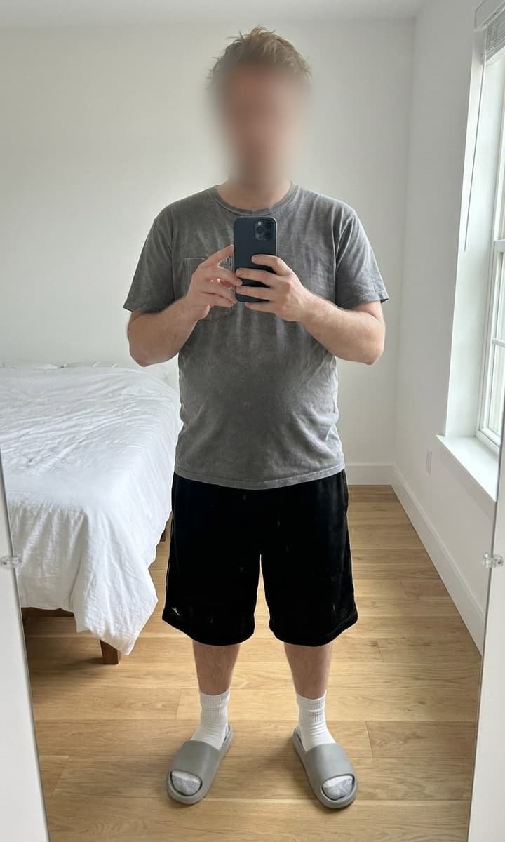 Full-length photo of Rafael in a T-shirt and shorts